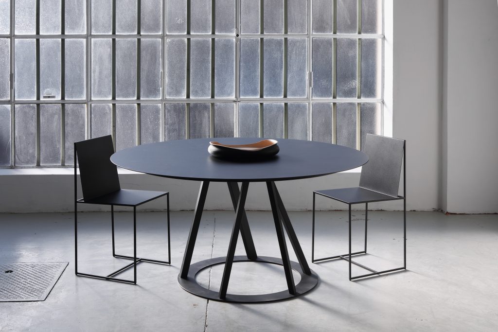 Zeus Big Irony Metal Round Dining Table contemporary steel black epoxy finish