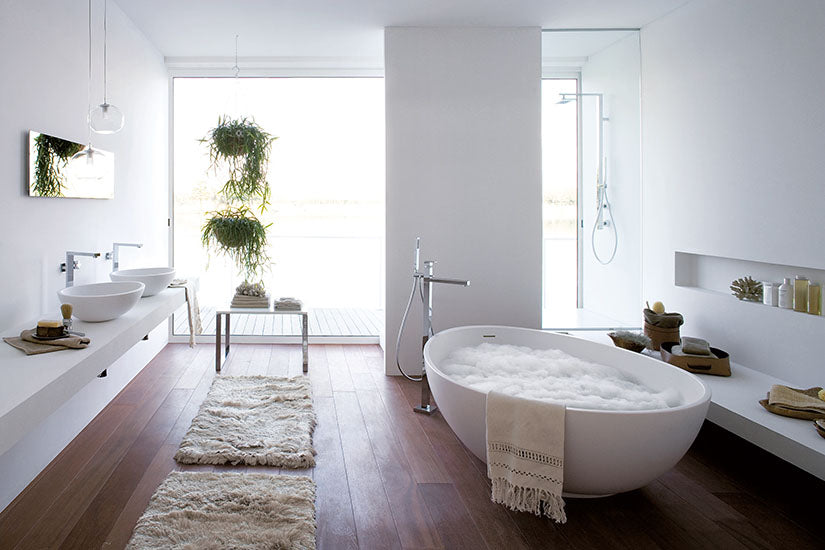 Mastella Vov Freestanding Bathtub in white cristalplant in  a contemporary designer bathroom