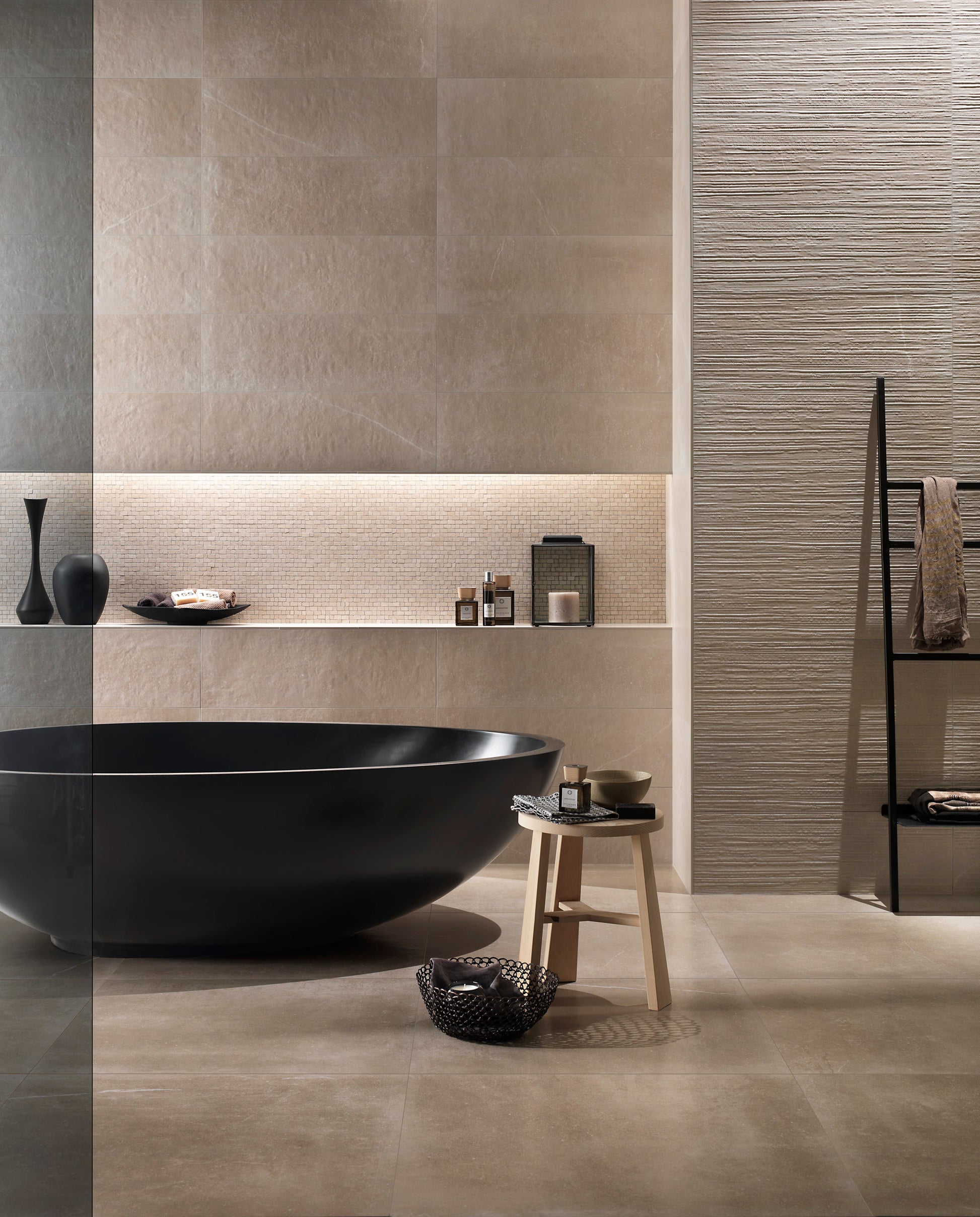 Vov Italian Freestanding Bathtub from Mastellla in black Cristalplant in  a contemporary designer Italian bathroom