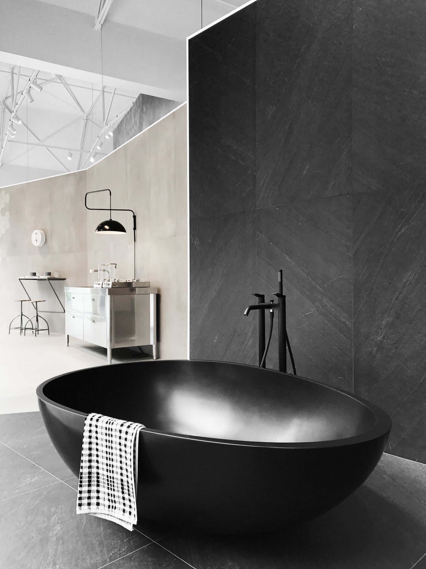 Mastella Vov Freestanding Bathtub in black Cristalplant in  a contemporary designer Italian bathroom