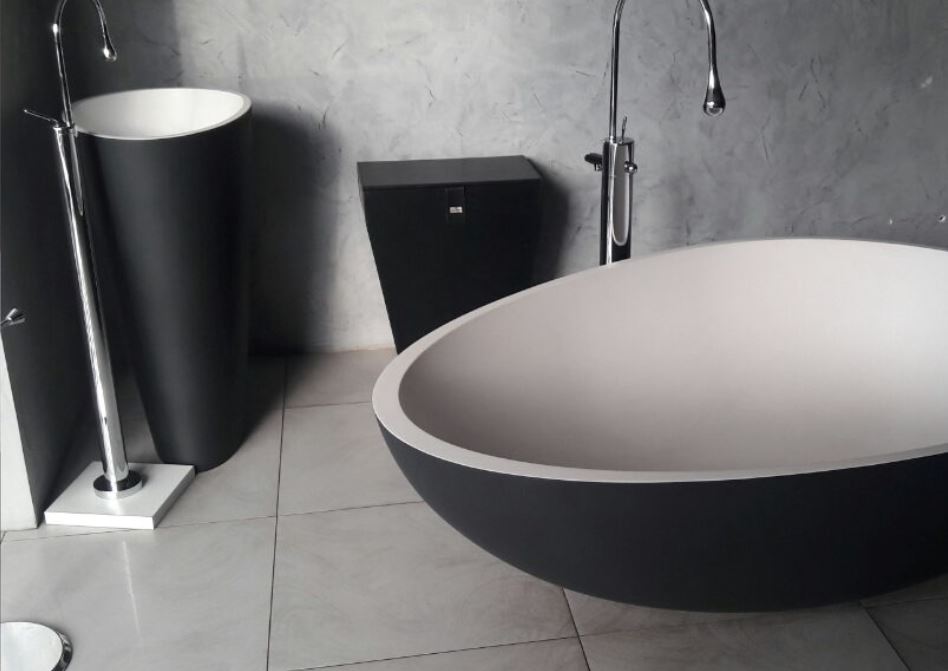 Mastella Body Floor Standing Basin and Vov Bathtub in bicolor cristalplant in a contemporary Italian designer bathroom