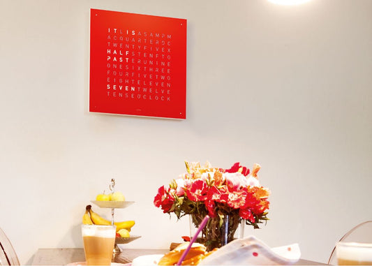Qlocktwo classic in red stainless steel matt powder coated wall clock in setting