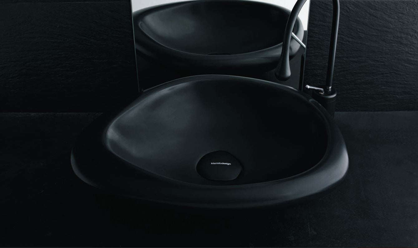 Mastella Sasso Countertop Basin in black cristalplant in a contemporary Italian designer bathroom