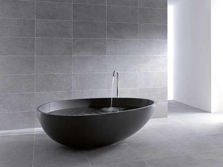 Mastella Vov Freestanding Bathtub in black Cristalplant in  a contemporary designer Italian bathroom
