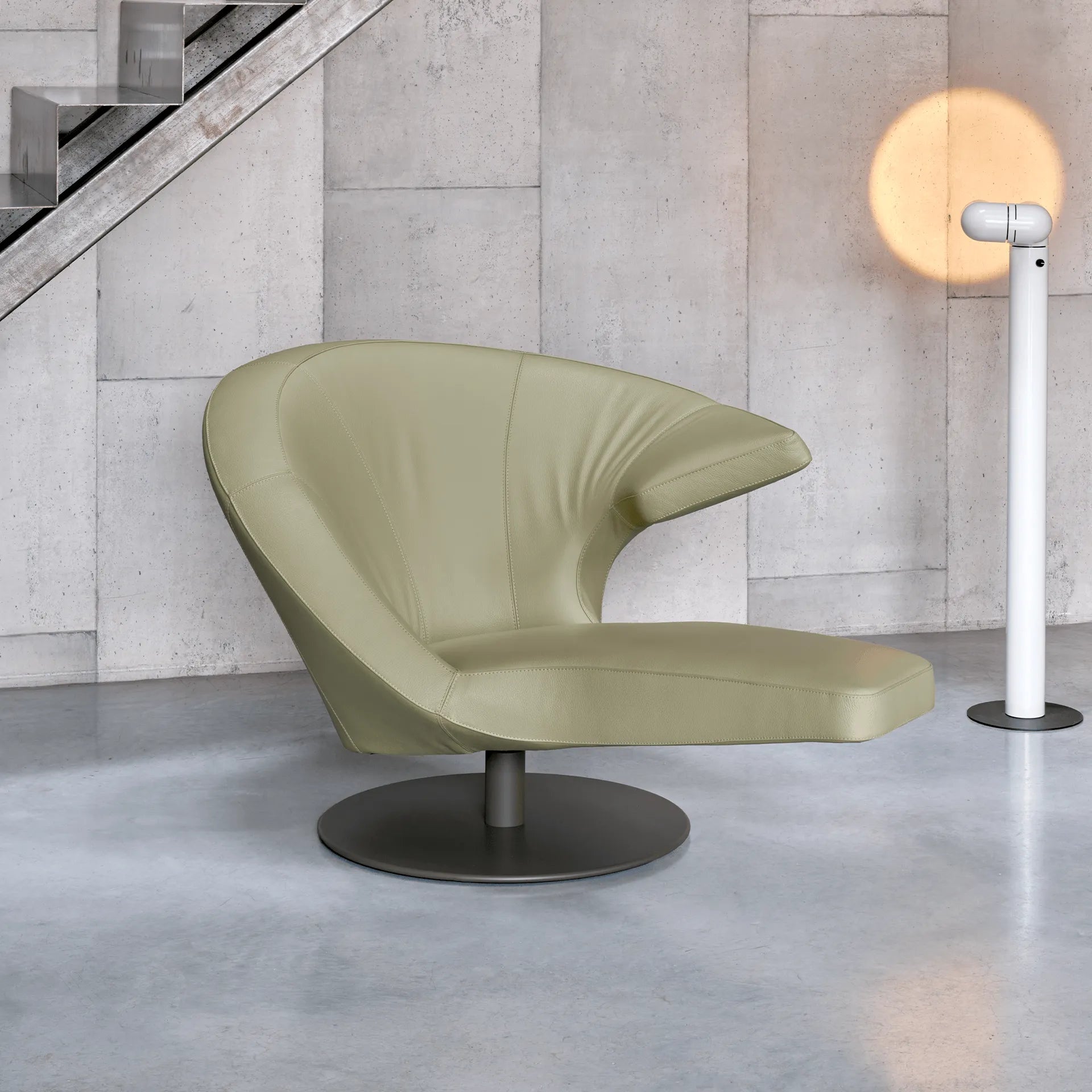Leolux Parabolica Swivel Lounge Chair Modern wasabi green in a minimalistic room with concrete walls