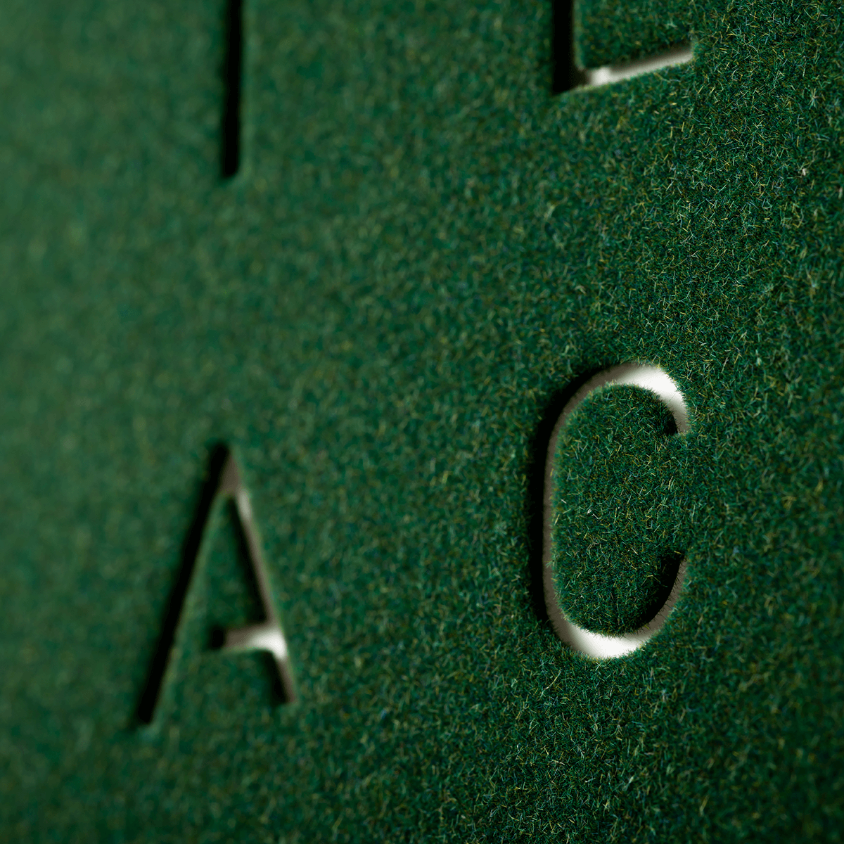 Qlocktwo Classic Wall clock green velvet finish detail