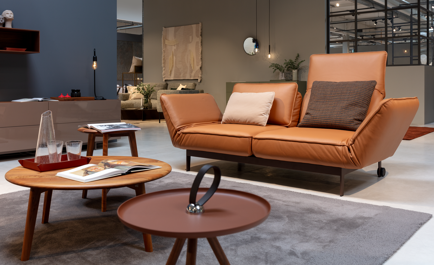 Rolf Benz Mera functional one-piece sofa with reclining backs in cognac leather