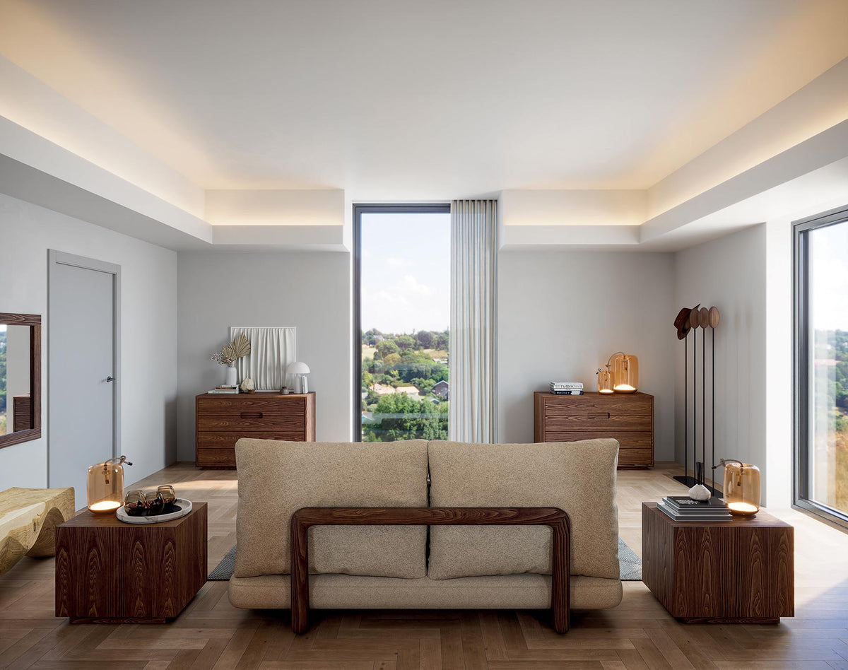 Riva 1920 Sospiro contemporary and modern wooden nightstand in solid walnut, featuring two drawers, photographed in contemporary bedroom setting with chest of drawers and  the Sospiro Bed