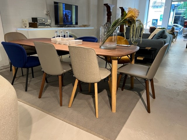Rolf Benz 616 Dining Chairs in beige grey fabric and leather with wooden base in a dining setting