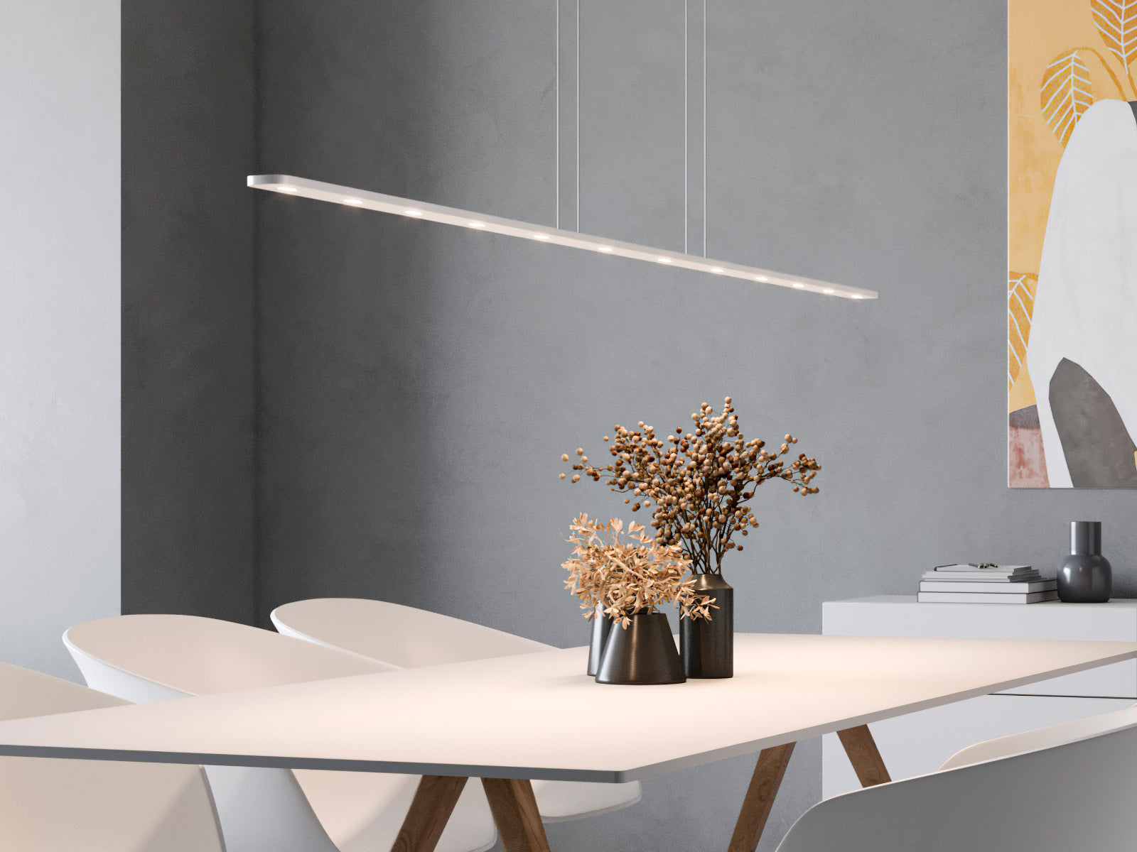 Byok Piani Mono Pendent Lamp in aluminum anodized finish over a dining table