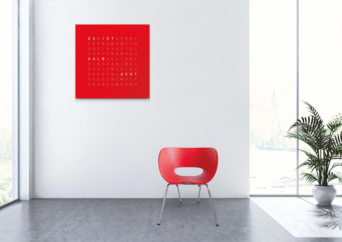 Qlocktwo large in red stainless steel matt powder coated wall clock in setting